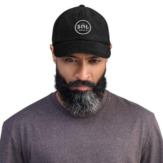 man in black hat